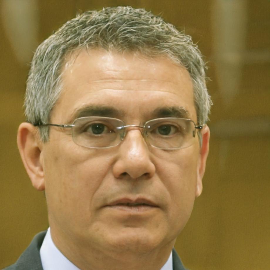 Financial professional reviewing integrated system dashboard on tablet device